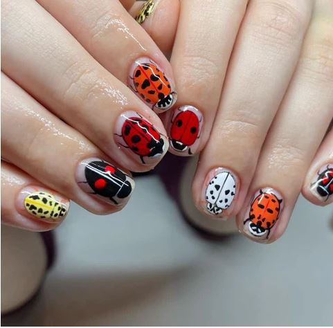 Painted Ladybug Nails by nailsthatlooklikepaintings