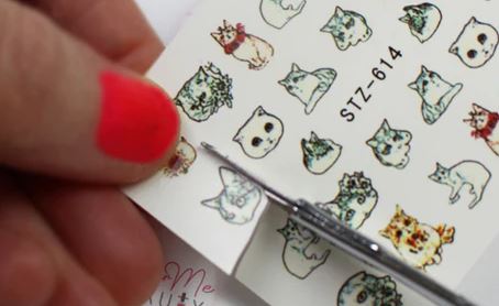 Cut out the nail decal.